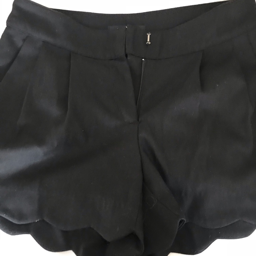 Scalloped black shorts